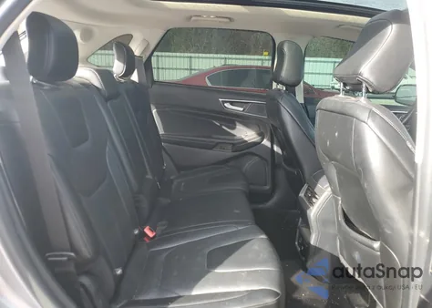 2021 Ford Edge Titanium z USA, uszkodzony, nr VIN 2FMPK4K97MBA27143